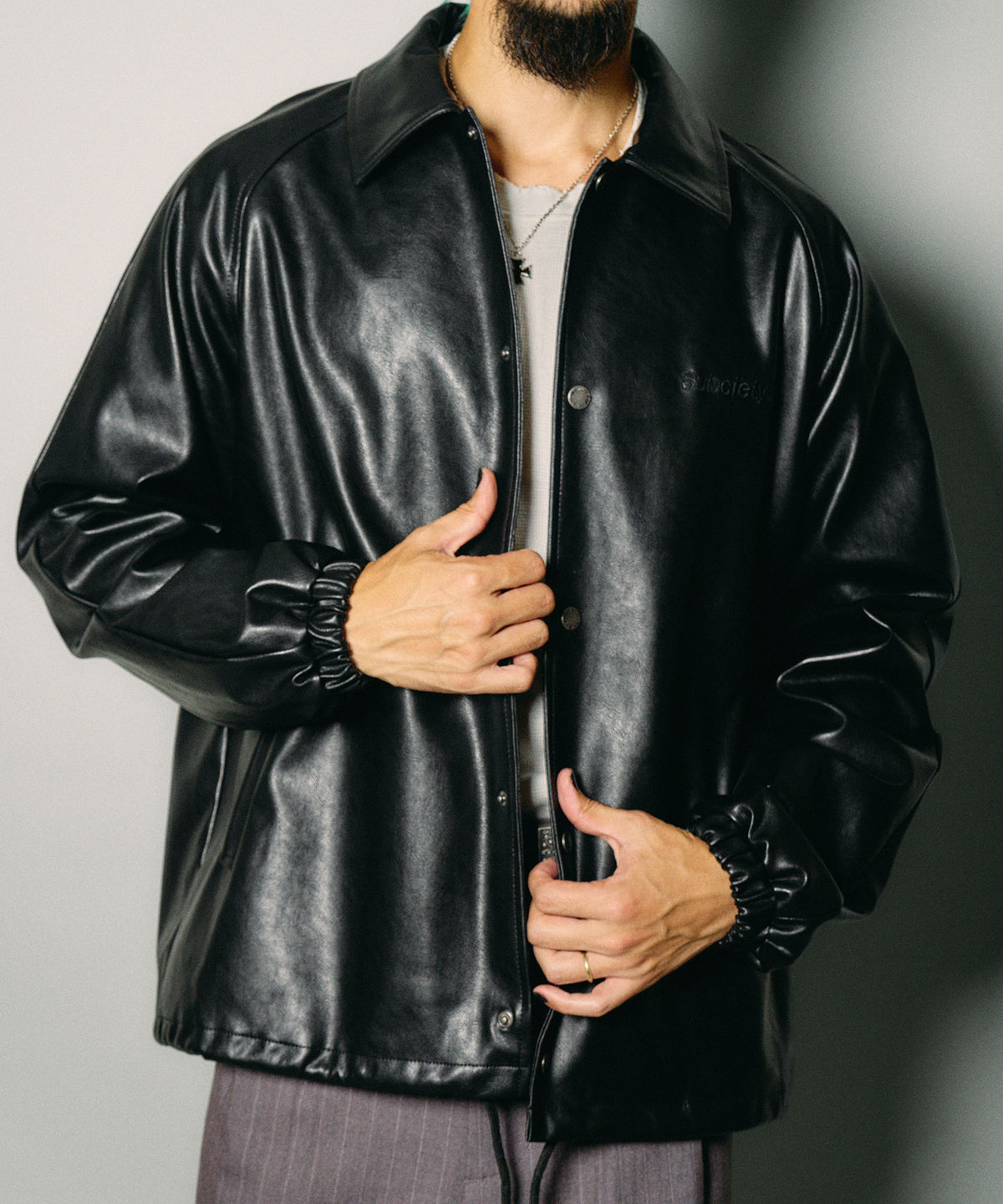 Faux leather coach jacket
