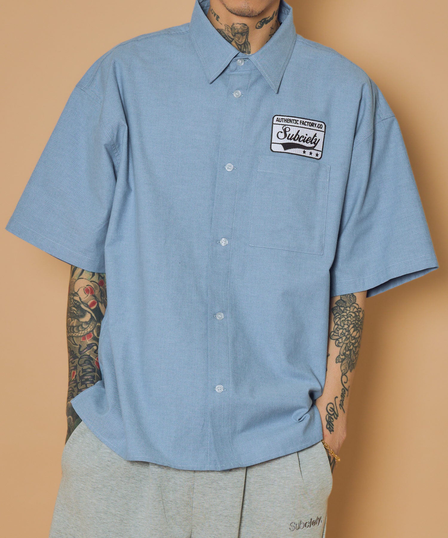 Square tail patch shirt