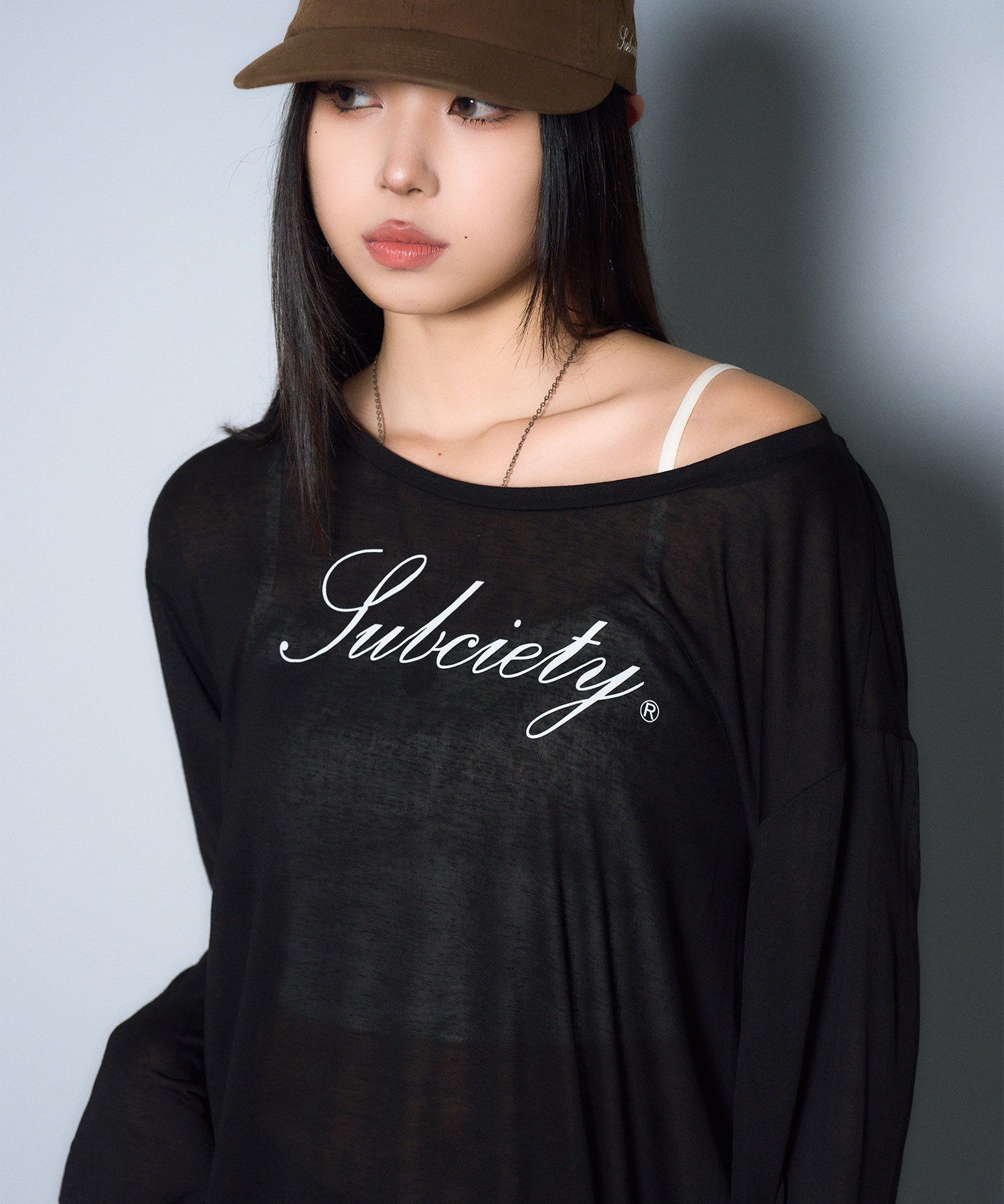 Off-shoulder sheer top