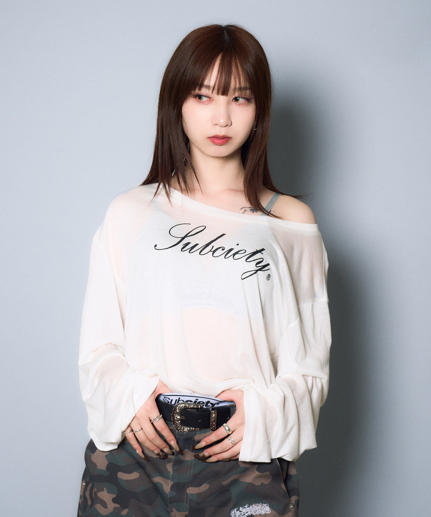 Off-shoulder sheer top